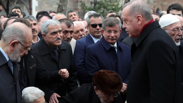 Cumhurbaşkanı Erdoğan, Şevket Kazan'ın cenazesinde Davutoğlu'nu görmezden geldi