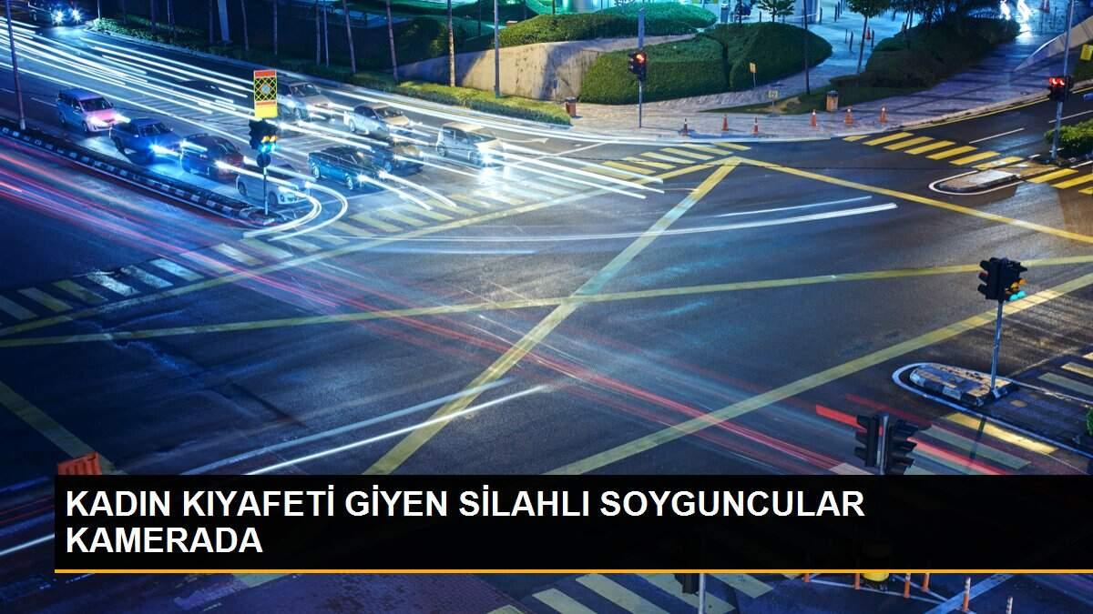 KADIN KIYAFETİ GİYEN SİLAHLI SOYGUNCULAR KAMERADA