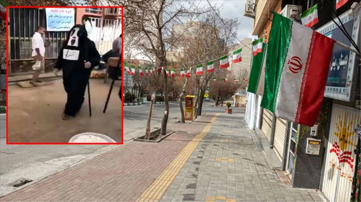 İran\'da belediye çalışanları, koronavirüste mesafenin önemini vurgulamak için Azrail kostümleriyle sokaklarda gezdi