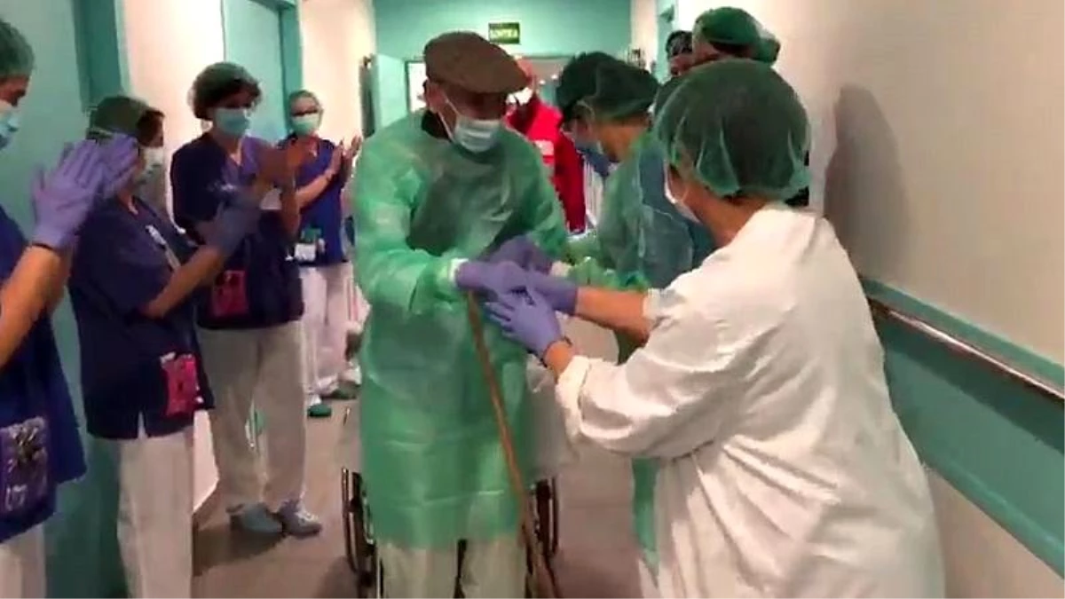 İspanya\'da koronavirüsü yenen 93 yaşındaki hasta, alkışlarla taburcu oldu