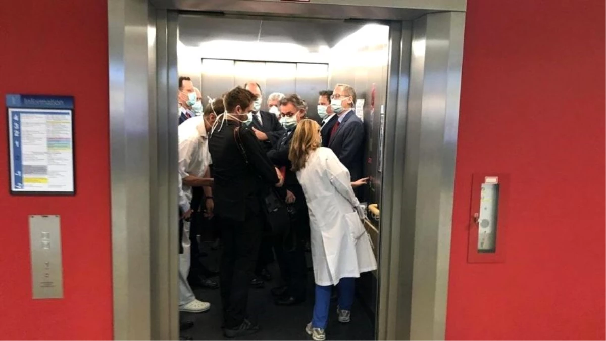 Almanya\'da kuralları hiçe sayan yetkililer, hep birlikte aynı asansöre doluştu