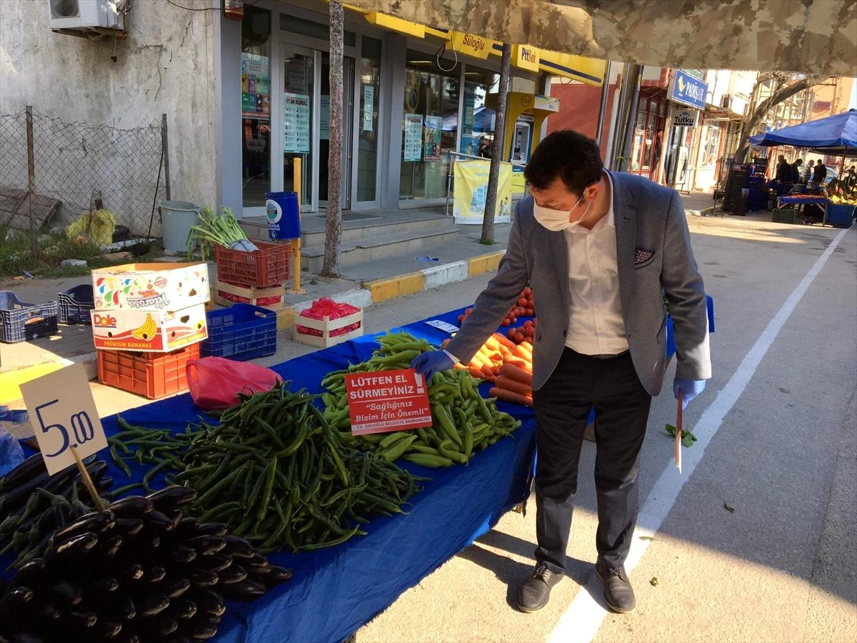 Süloğlu\'nda pazar tezgahlarına koronavirüse karşı uyarıcı kartlar asıldı