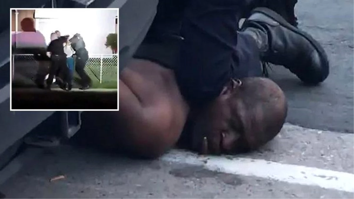 ABD\'de polis şimdi de siyahi bir kadını yumrukladı