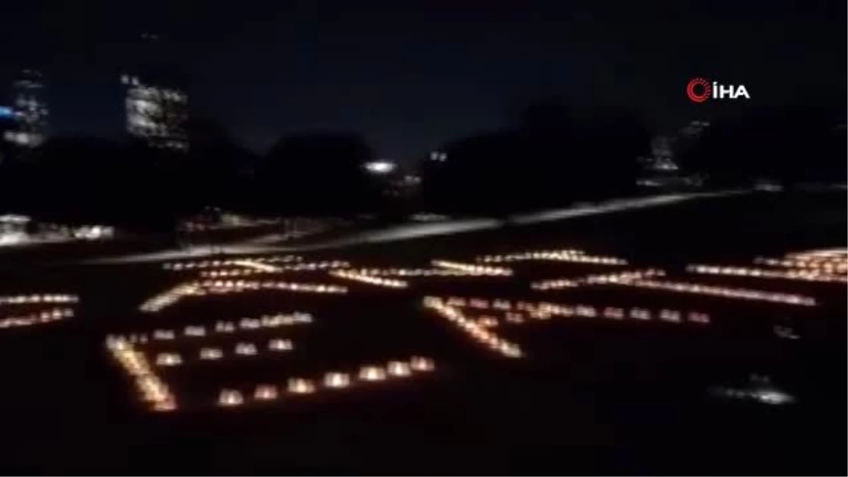 Son dakika haberi | - Avustralya\'da ırkçılığa karşı sessiz protesto- 433 mumun kullanımıyla "I can\'t breathe" yazıldı