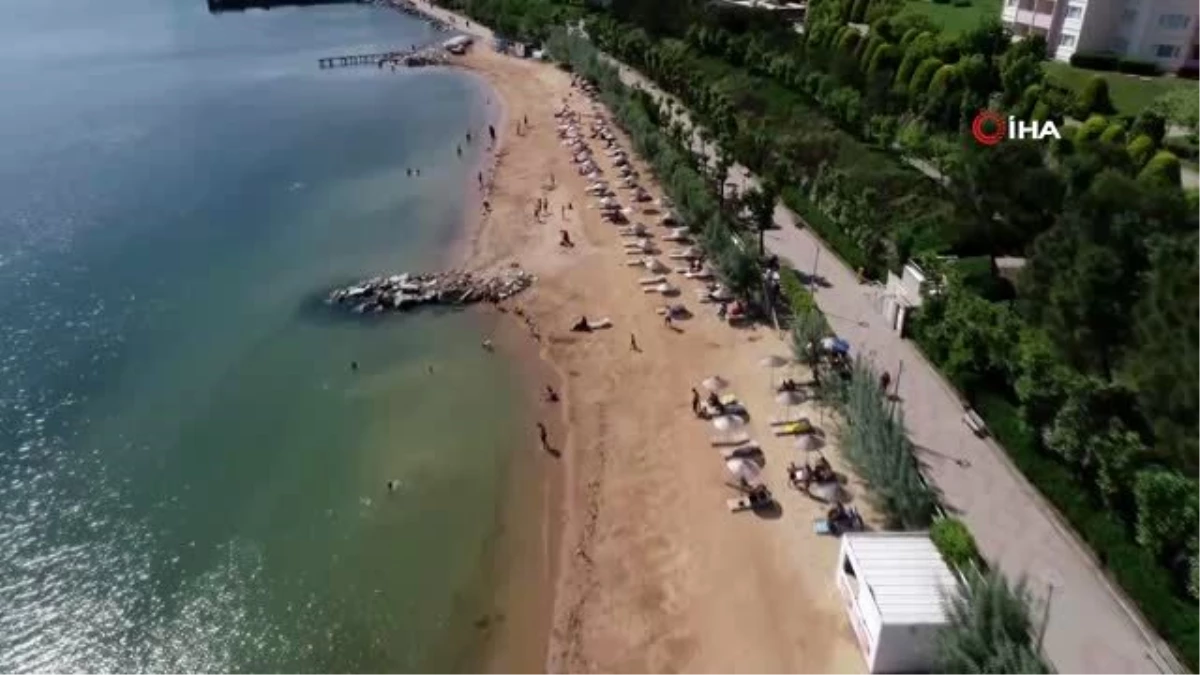 Marmara\'da deniz sezonu açıldı, tatilciler Armutlu\'ya akın etti