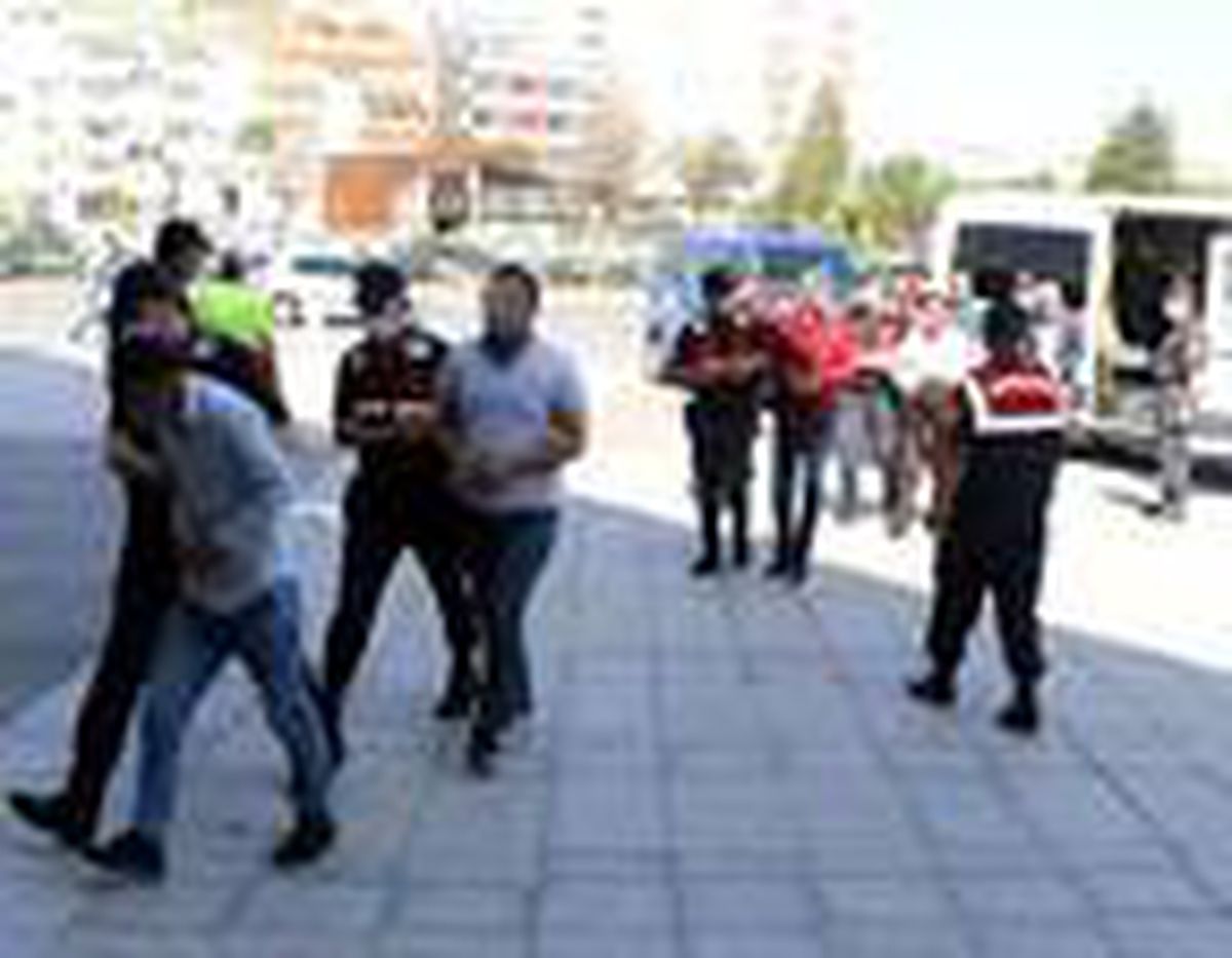 14 ildeki \'göçmen kaçakçılığı\' operasyonunda 21 şüpheli adliyede