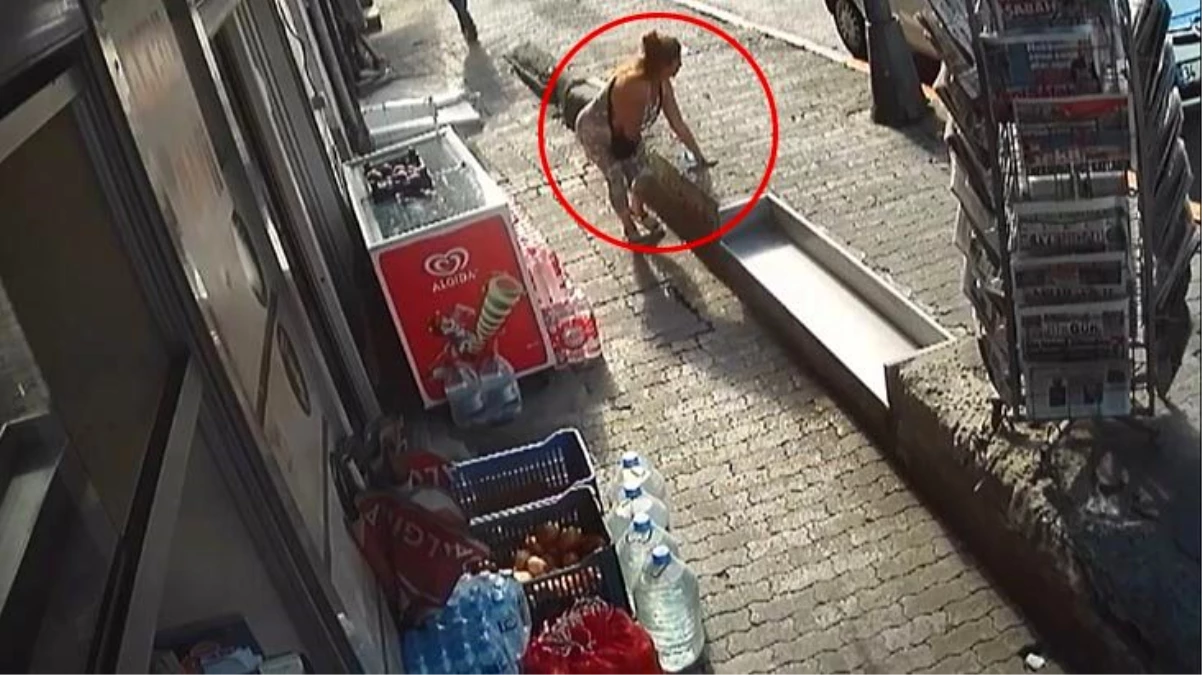 İstanbul\'un göbeğinde bir kadının sevgilisi tarafından silahla yaralandığı anlar kamerada