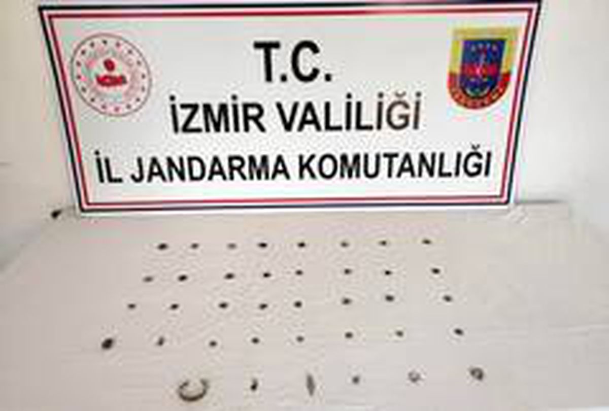 Tarihi paraları satamadan yakalandı