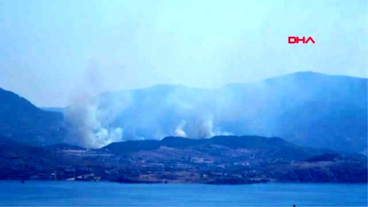 Son dakika haber... ÇANAKKALE Midilli Adası\'ndan yükselen dumanlar, Assos sahilinden görüldü