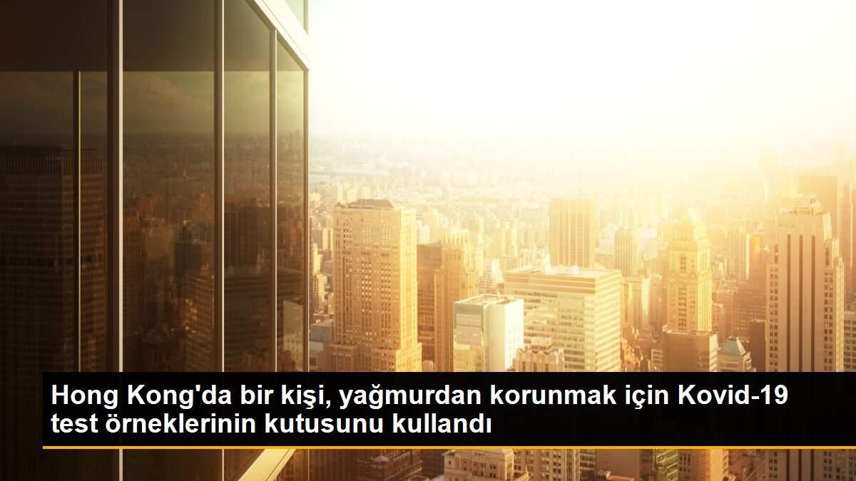 Son Dakika | Hong Kong\'da bir kişi, yağmurdan korunmak için Kovid-19 test örneklerinin kutusunu kullandı