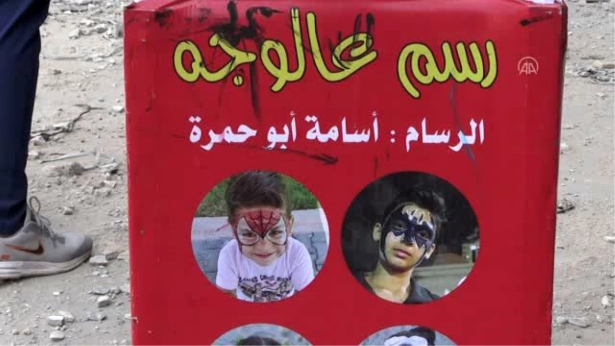 Son dakika haber! Gazzeli sanatçı, maske kullanımını teşvik için çocukların yüzlerini boyuyor