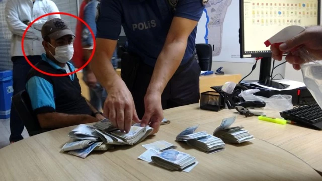 Temizlik işçisi bulduğu para dolu poşeti polise teslim etti