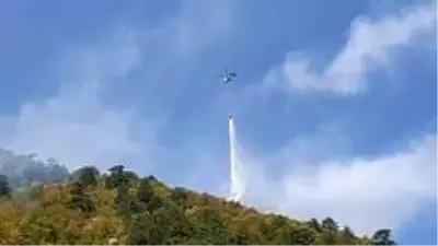 Karabük'teki orman yangınına uçak ve helikopterle müdahale ediliyor Karabük'teki orman yangınına uçak ve helikopterle müdahale ediliyor