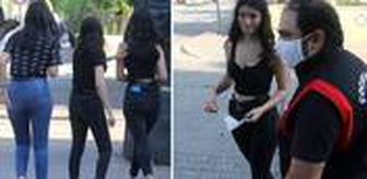 Maskeyi koluna takan genç kız, denetimdeki polisleri görünce kaçmaya başladı