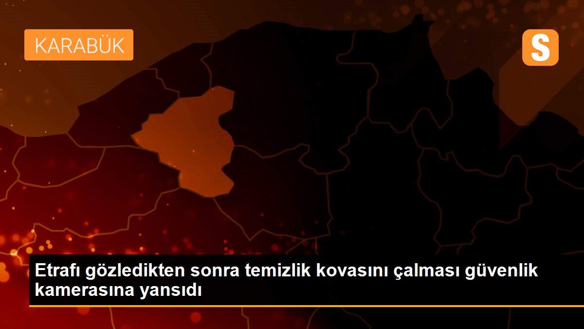 Etrafı gözledikten sonra temizlik kovasını çalması güvenlik kamerasına yansıdı