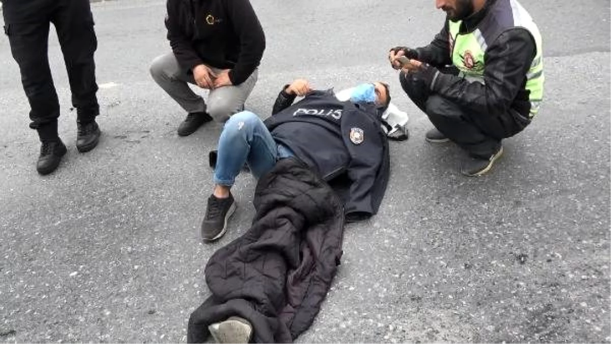 Son dakika gündem: Esenyurt\'ta polis kaza yapan kişinin üzerine montunu örttü