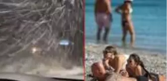 Antalya'da iki ayrı manzara! Bir tarafta deniz ve güneş, diğer tarafta lapa lapa kar