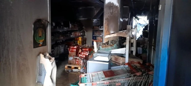 Milas'taki yangında markette büyük zarar oluştu