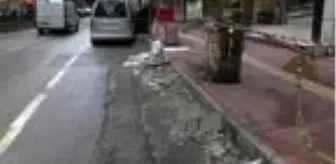 Apartmandan kopan dış cephe kaplamasından, kaldırımdakiler bir adımla kurtulmuş