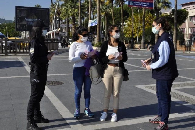 Marmaris'te Polis ve Jandarma kadına yönelik şiddete karşı broşür dağıttı