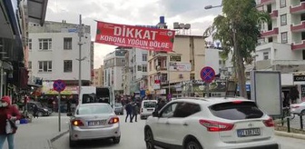Samandağ'da bazı caddelere 'korona yoğun bölge' afişi asıldı