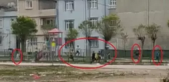 Kısıtlamaya rağmen parkta oynayan çocukların polisten kaçma anı kamerada