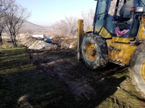 Kepçenin kazı sırasında kırdığı küpten 300'den fazla sikke çıktı