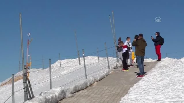 Son dakika haberleri... Zirvede gün batımı keyfini Kovid-19 da kaçıramadı