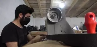 8 çocuğuyla çanta üretiyor