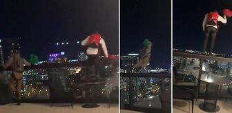 Otelin çatısından paraşütle atlayanlar paniğe neden oldu! O anlar kamerada