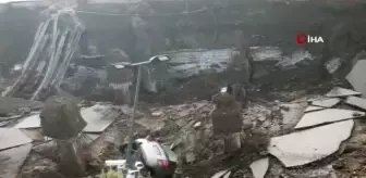 İtalya'da açık otopark çöktü, araçlar göçük altında kaldı