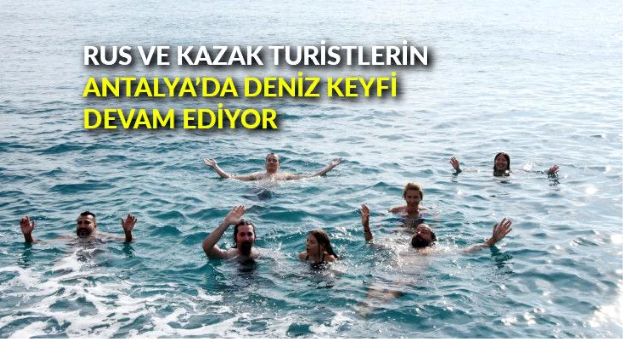 Rus ve Kazak turistlerin Antalya\'da deniz keyfi devam ediyor