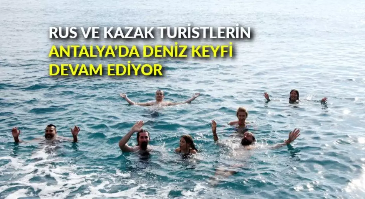 Rus ve Kazak turistlerin Antalya\'da deniz keyfi devam ediyor