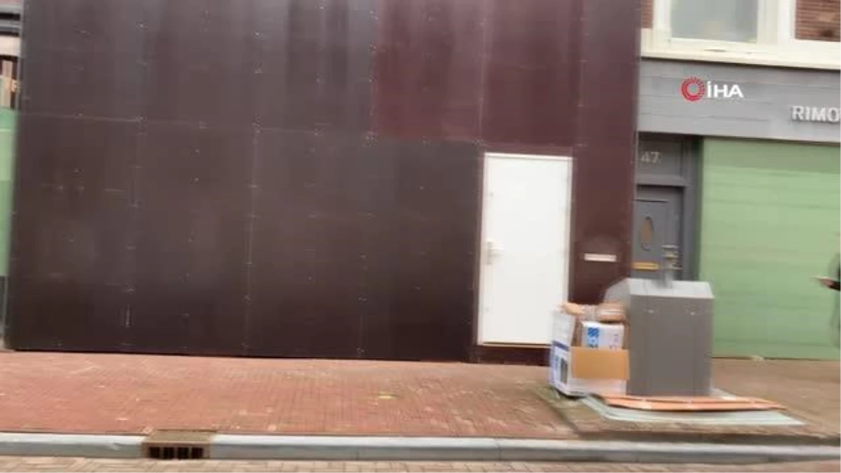 Amsterdam\'da ünlü mağazalardan yağmalara karşı beton ve tahta plakalı önlem