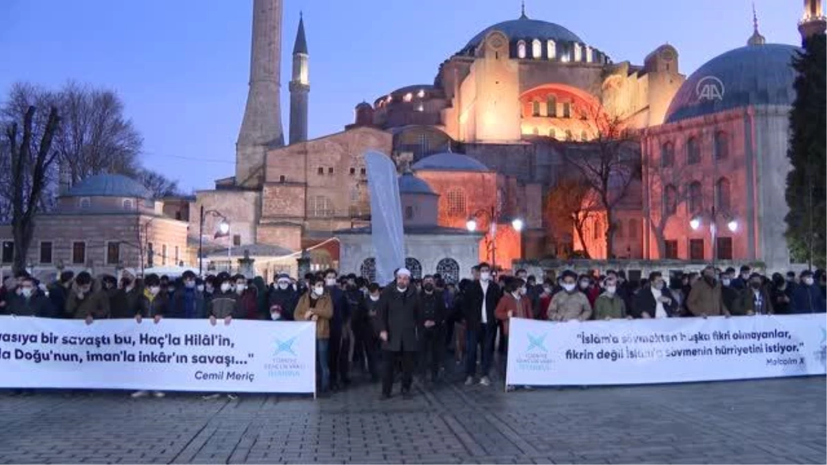 TÜGVA Boğaziçi Üniversitesi önünde Kabe fotoğrafının yere serilmesine tepki gösterdi