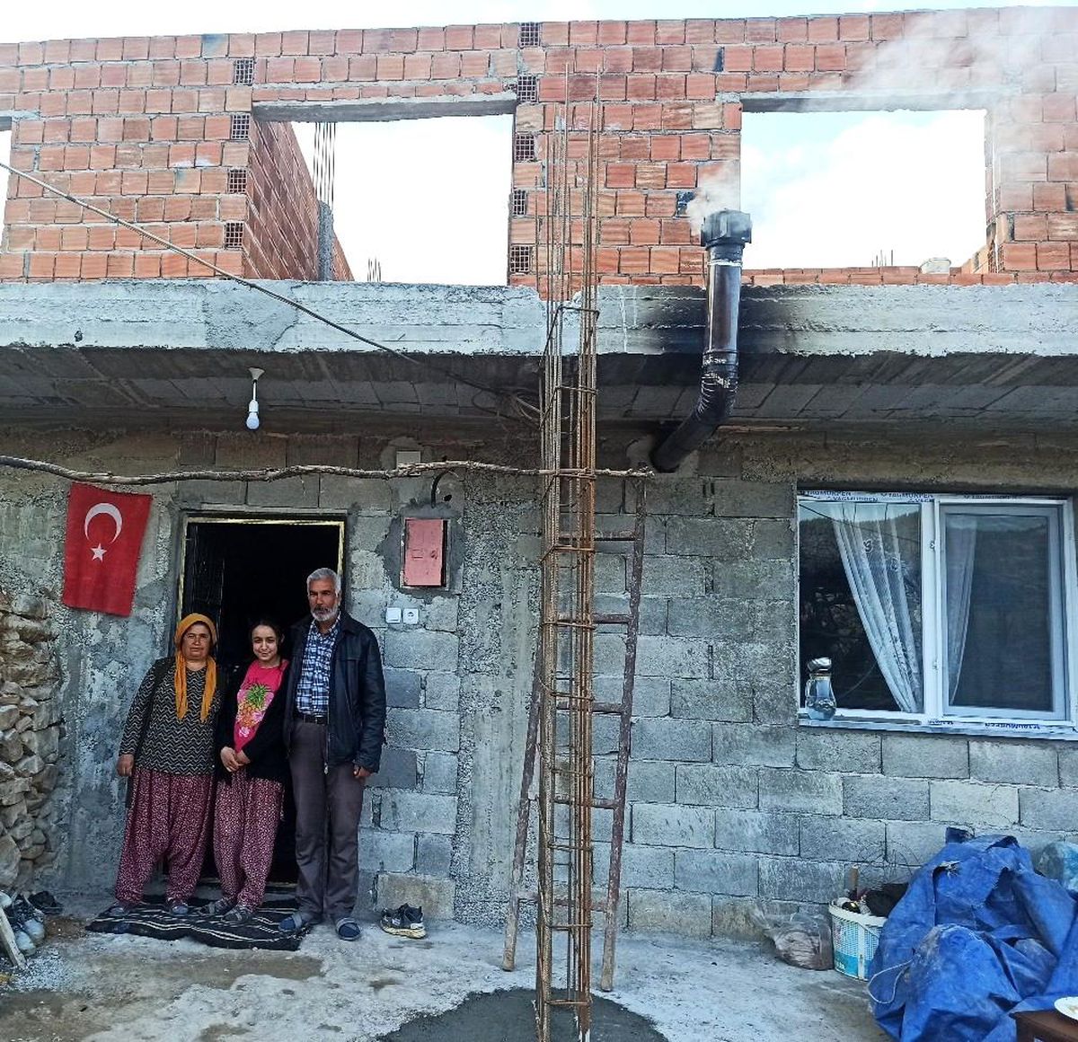 Aksu ailesi yeni evine kavuştu