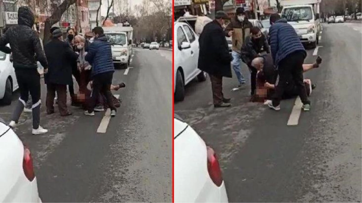 Görüntü 8 Mart Dünya Kadınlar Günü\'nde çekildi! Sokak ortasında karısını yere yatırıp böyle darbetti