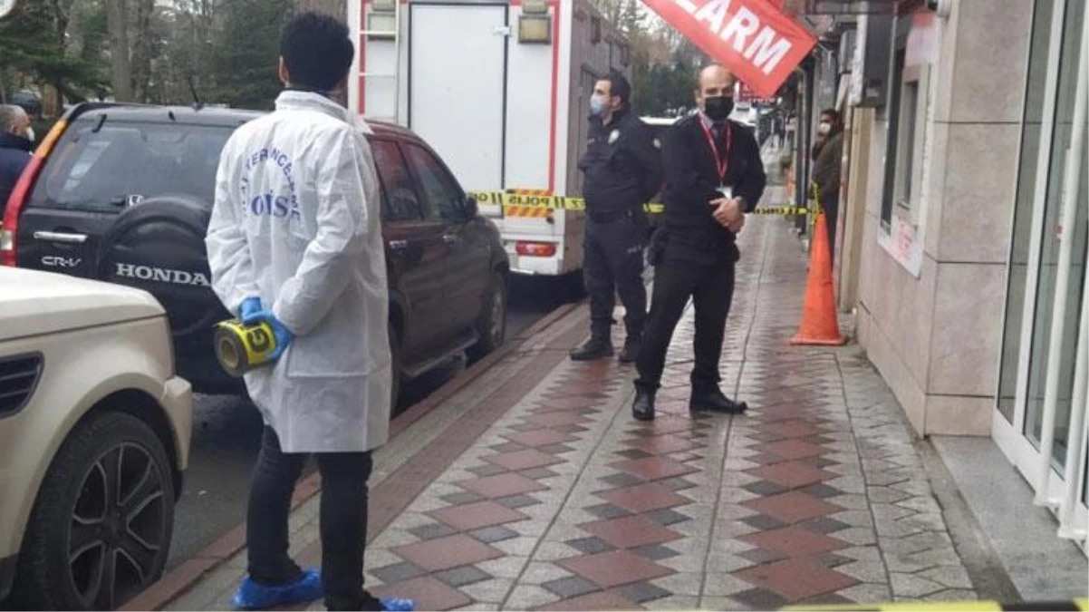 \'Biber gazlı\' banka soyguncusu her yerde aranıyor! Güvenliği bıçaklayıp paraları aldı