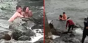 Dalgalarla boğuşan kızı kurtarmak için bir an bile düşünmedi! Yaşam mücadelesi kamerada