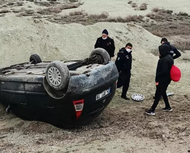 Takla atan araçtan yara almadan kurtuldu