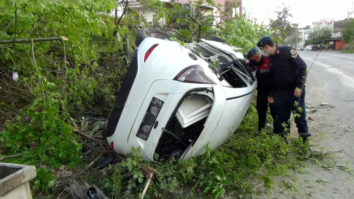 Takla atıp hurdaya dönen otomobilden hafif yaralı kurtuldular