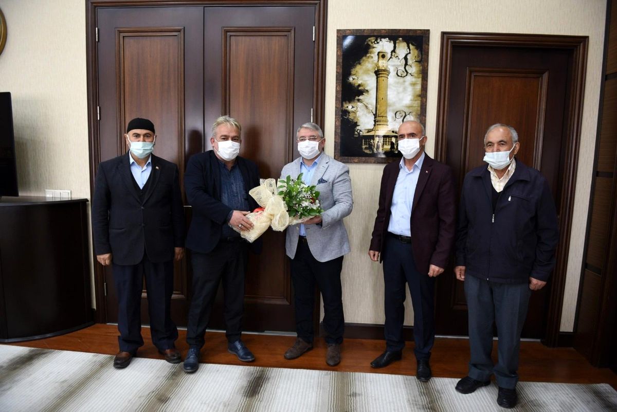 Şehit ailelerinden Başkan Aşgın\'a teşekkür ziyareti