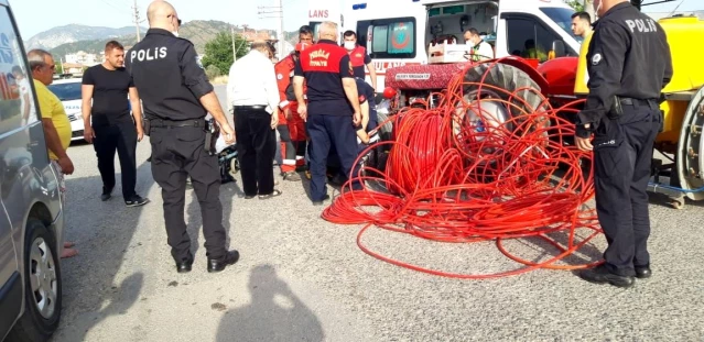 Traktörün altında sıkışan kadını itfaiye kurtardı