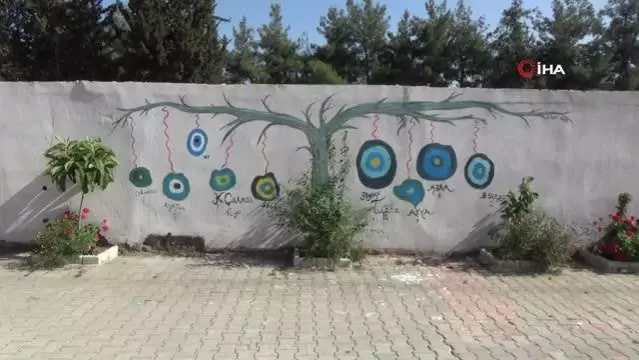 Yaşadıkları sokağı açık hava resim sergisine çevirdiler Yaşadıkları sokağı açık hava resim sergisine çevirdiler