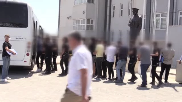 Aydın merkezli dolandırıcılık operasyonunda yakalanan şüphelilerden 14'ü tutuklandı