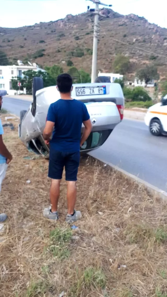 Son dakika! Devrilen otomobilin sürücüsü kazadan yara almadan kurtuldu