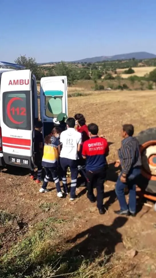 Son dakika haber... Devrilen traktörün altında kalan sürücüyü itfaiye kurtardı