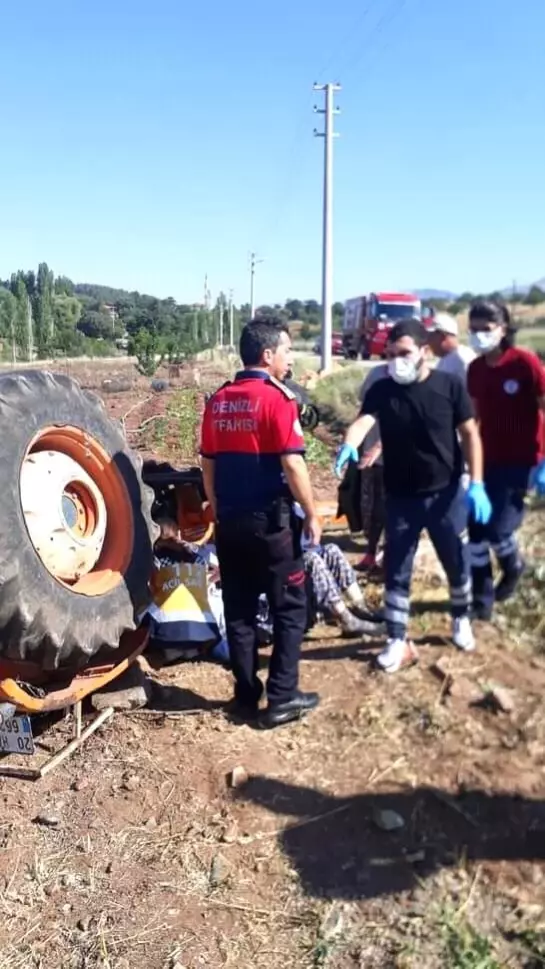 Son dakika haber... Devrilen traktörün altında kalan sürücüyü itfaiye kurtardı