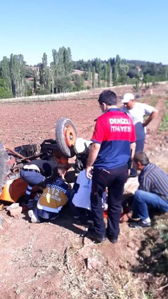 Son dakika haber... Devrilen traktörün altında kalan sürücüyü itfaiye kurtardı