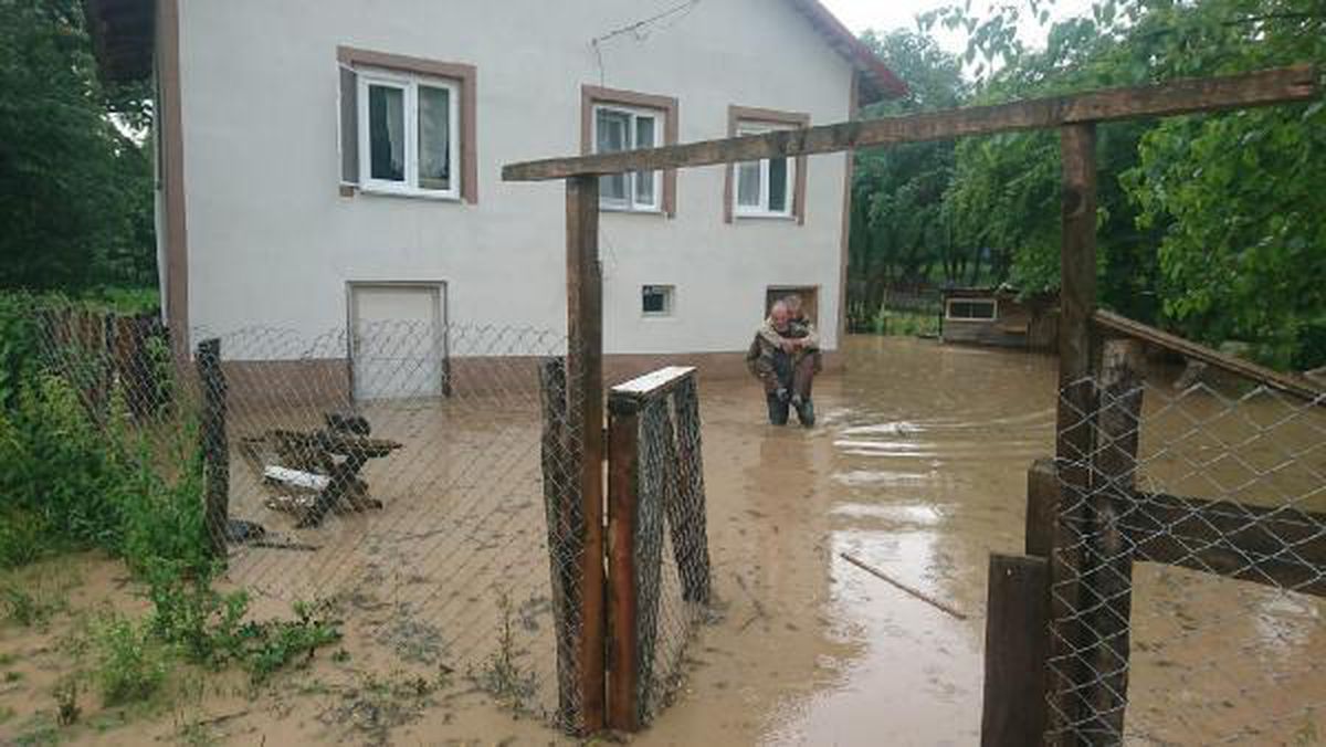 He carried his disabled neighbor on his back out of the flooded house